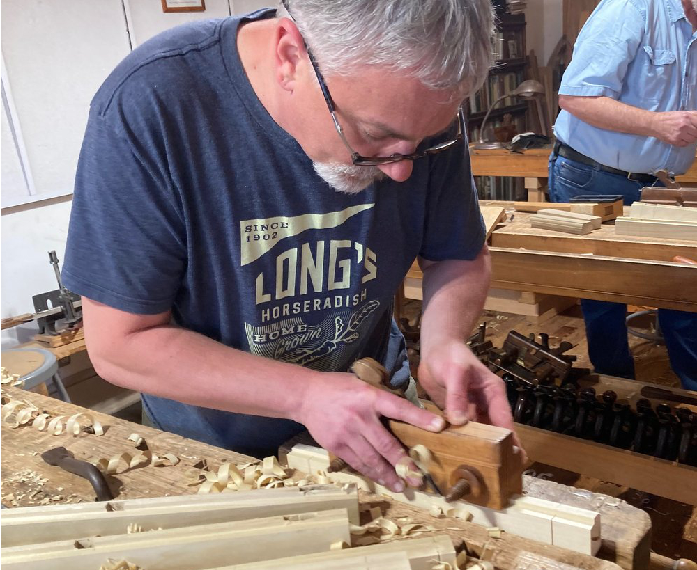 me working with a hand plane